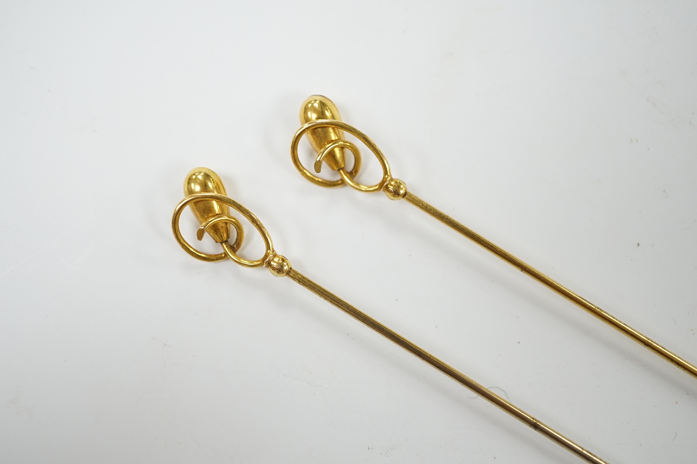 A pair of George V 9ct gold hat pins by Charles Horner, 31.1cm, 4.8 grams. Condition - good